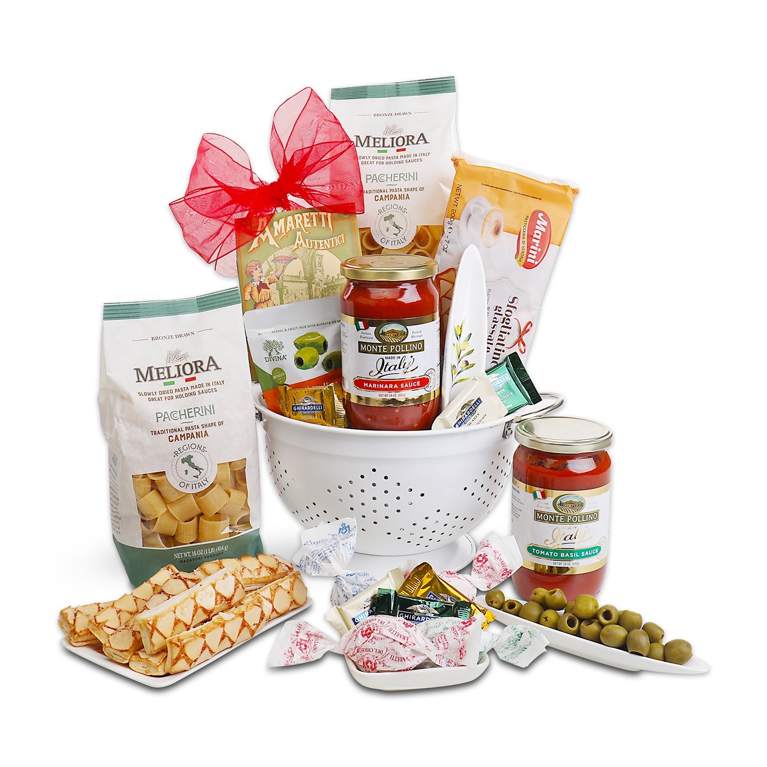 Gourmet gift basket with snacks, pasta, and condiments on a white background